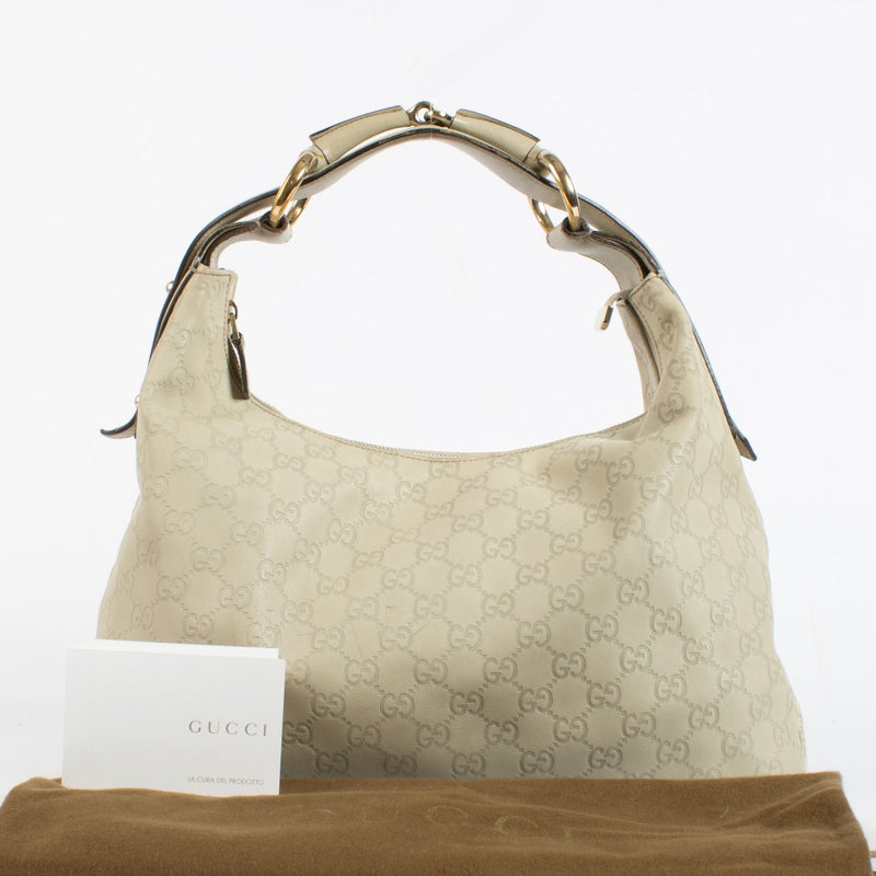 Authentic pre-loved Gucci Beige Guccissima Horsebit Small Hobo Bag on Labellov.com