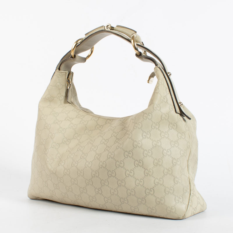 Authentic pre-loved Gucci Beige Guccissima Horsebit Small Hobo Bag on Labellov.com