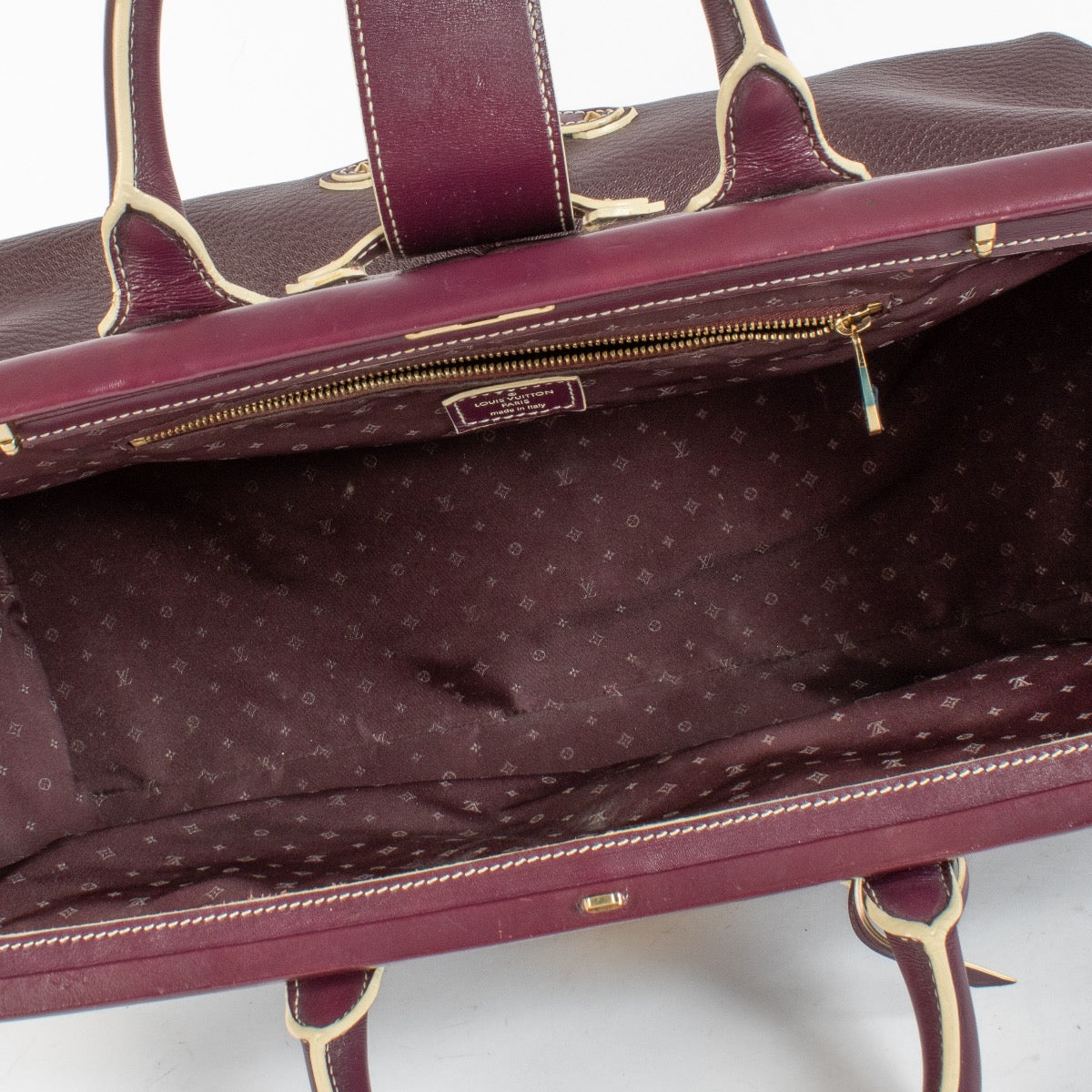 authentic preloved Louis Vuitton Purple Souhali L'ingénieux GM Top Handle on Labellov.com