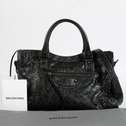 Shop the authentic Balenciaga Black Arena Le Cité Medium Bag second hand on Labellov.com.