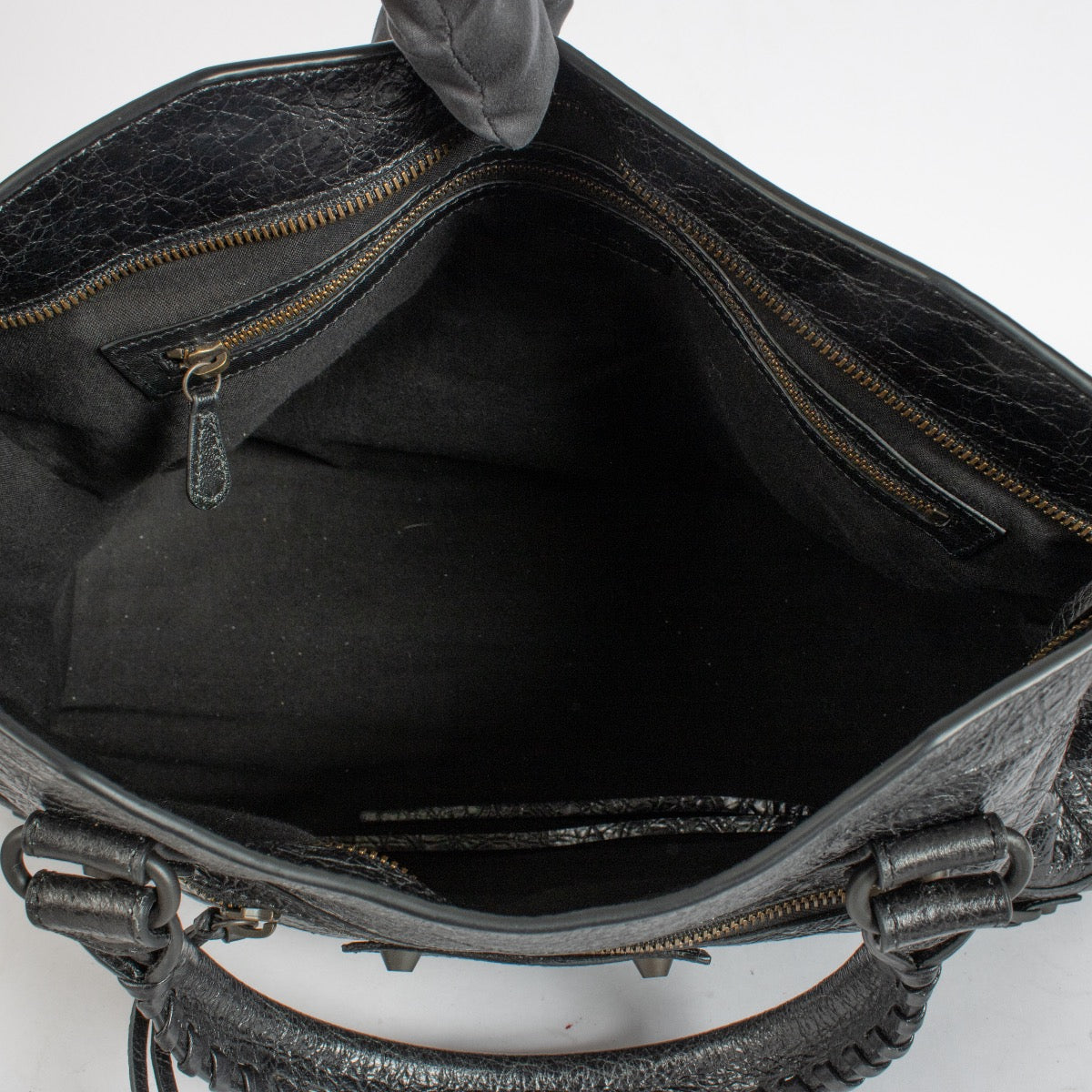 Shop the authentic Balenciaga Black Arena Le Cité Medium Bag second hand on Labellov.com.