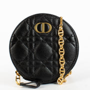 Christian Dior Black Caro Round Pouch Crossbody Bag in quilted black leather with gold CD hardware at Labellov.com