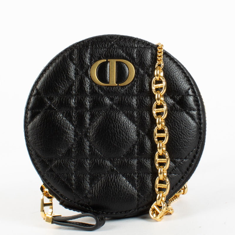 Christian Dior Black Caro Round Pouch Crossbody Bag in quilted black leather with gold CD hardware at Labellov.com
