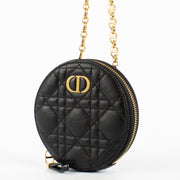 Christian Dior Black Caro Round Pouch Crossbody Bag in quilted black leather with gold CD hardware at Labellov.com