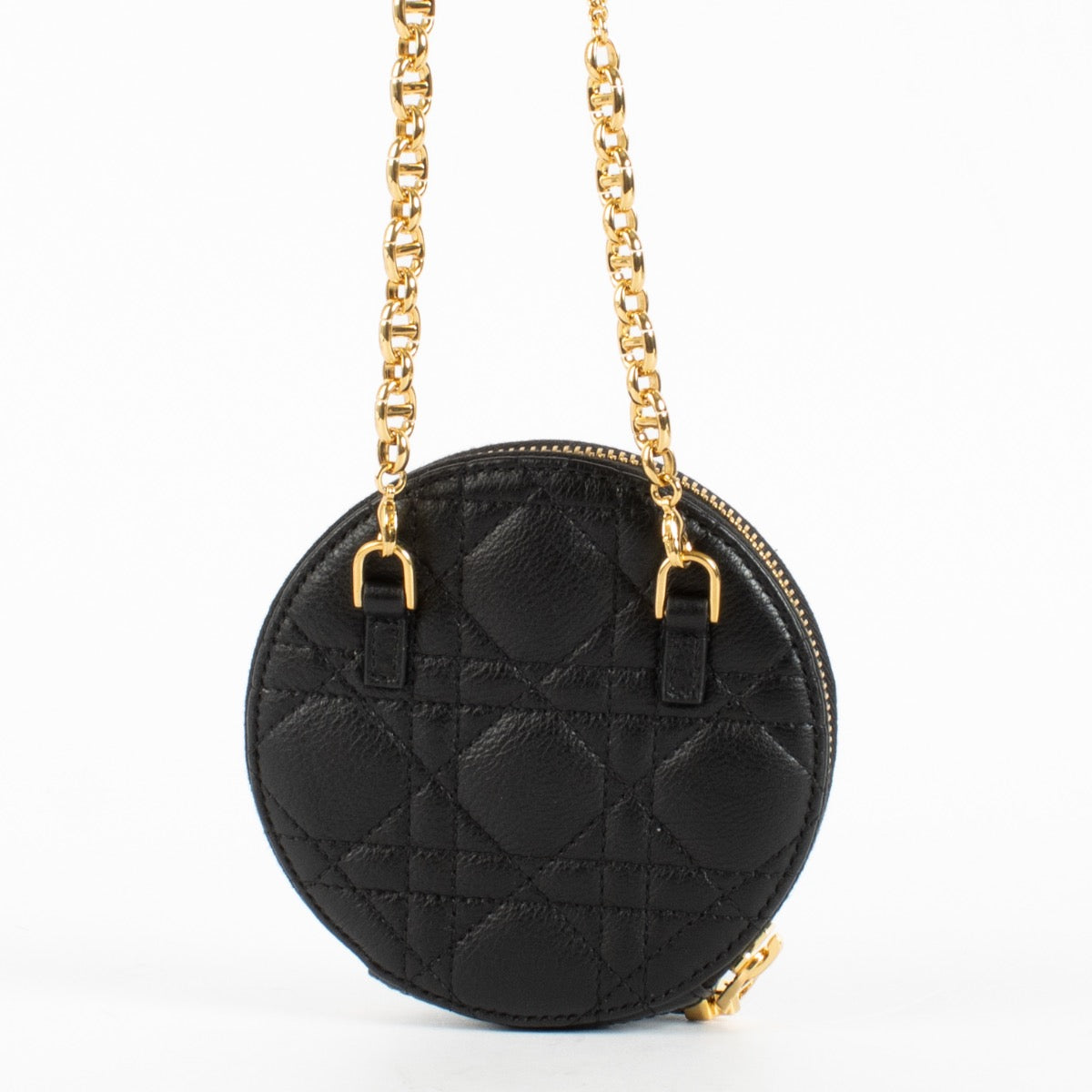 Christian Dior Black Caro Round Pouch Crossbody Bag in quilted black leather with gold CD hardware at Labellov.com