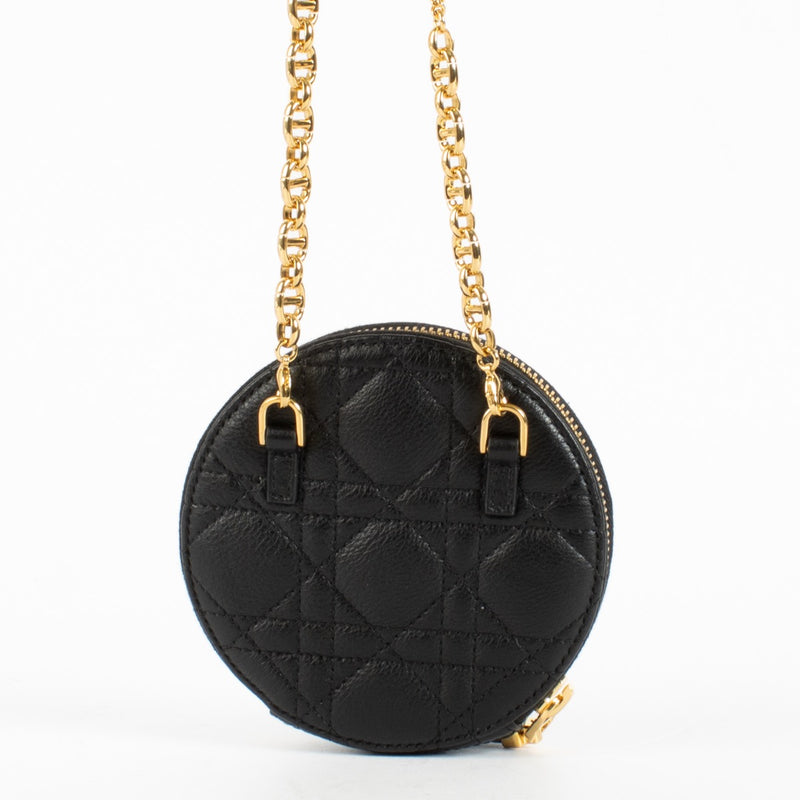 Christian Dior Black Caro Round Pouch Crossbody Bag in quilted black leather with gold CD hardware at Labellov.com