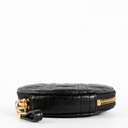 Christian Dior Black Caro Round Pouch Crossbody Bag in quilted black leather with gold CD hardware at Labellov.com