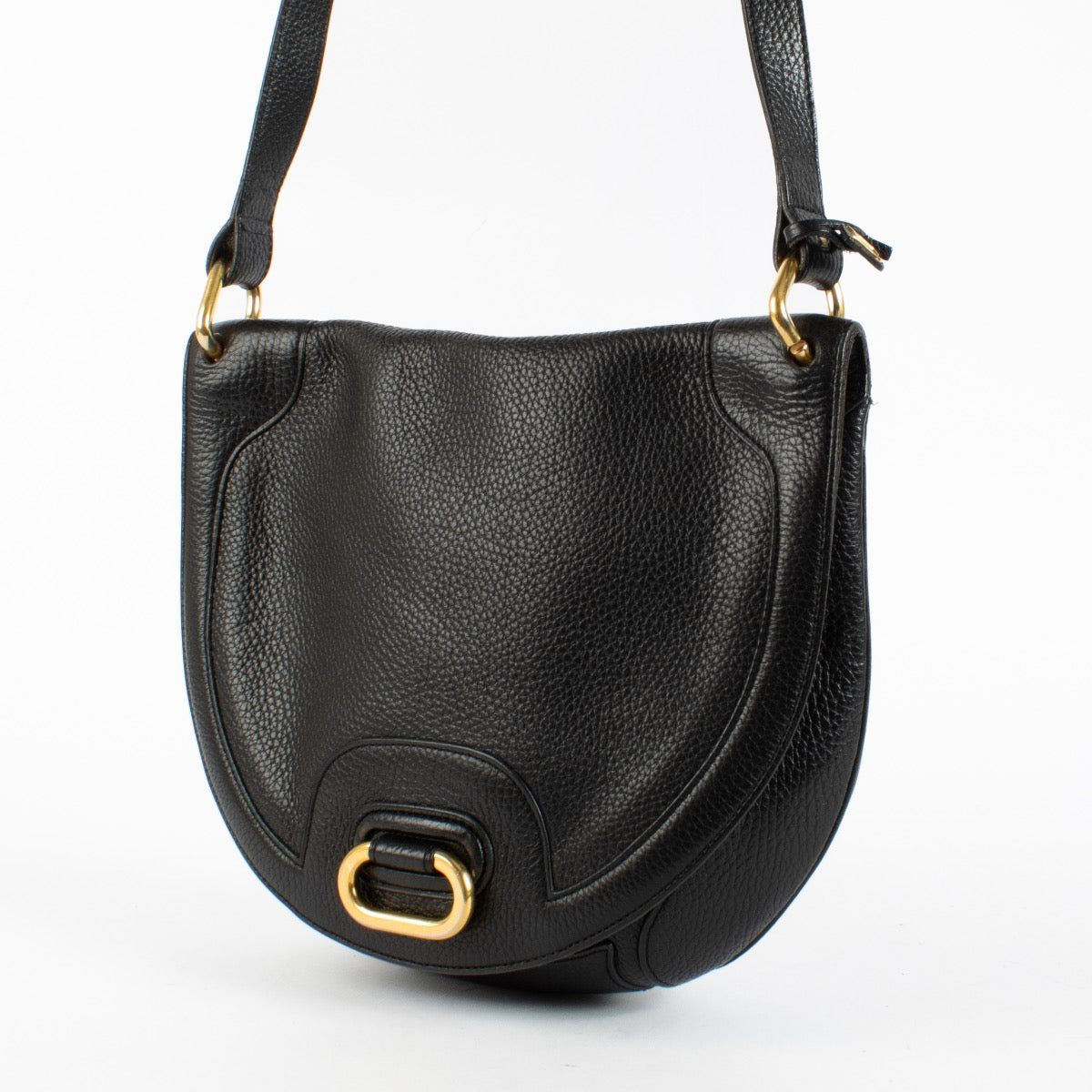 Delvaux black leather crossbody bag with gold hardware and saddle silhouette at Labellov.com