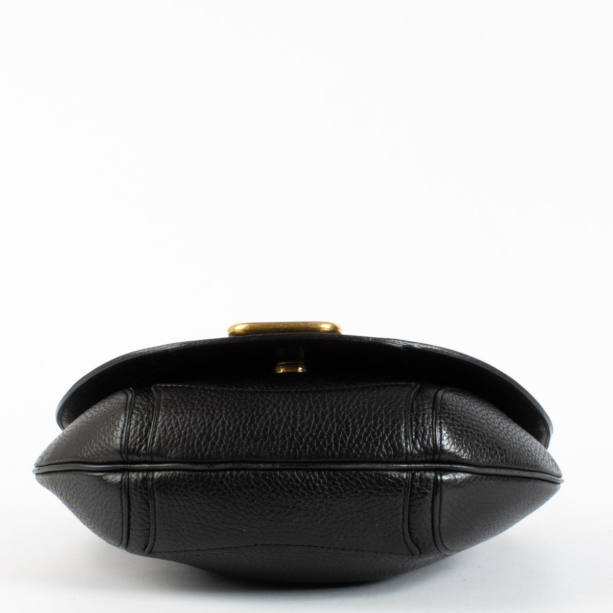 Delvaux black leather crossbody bag with gold hardware and saddle silhouette at Labellov.com
