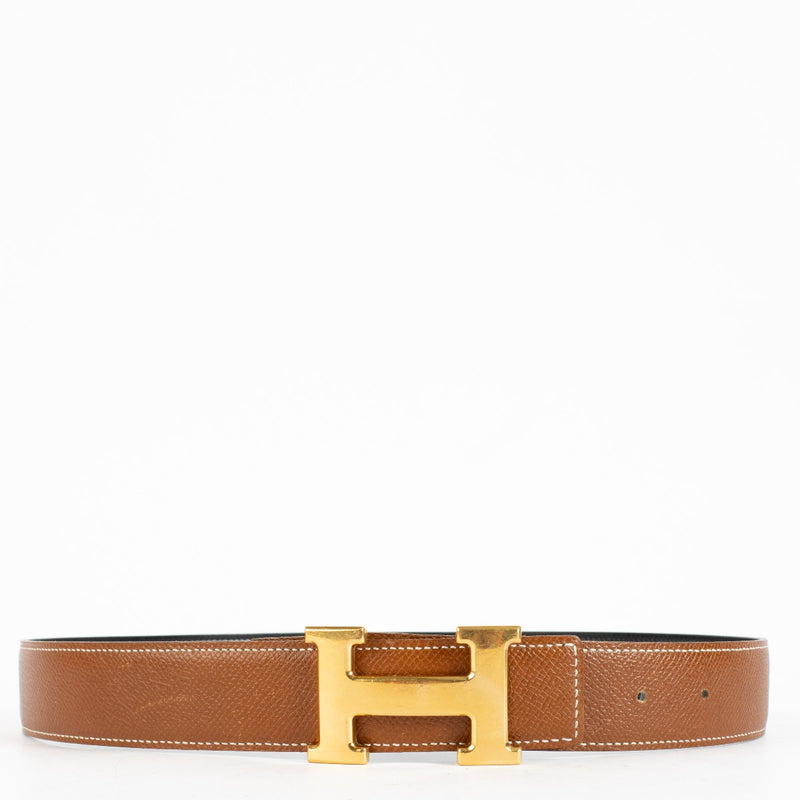 shop 100% authentic second hand Hermès Gold/Black H Buckle Reversible Belt - Size 80 on Labellov.com