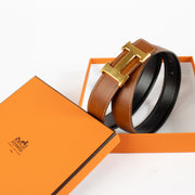 shop 100% authentic second hand Hermès Gold/Black H Buckle Reversible Belt - Size 80 on Labellov.com