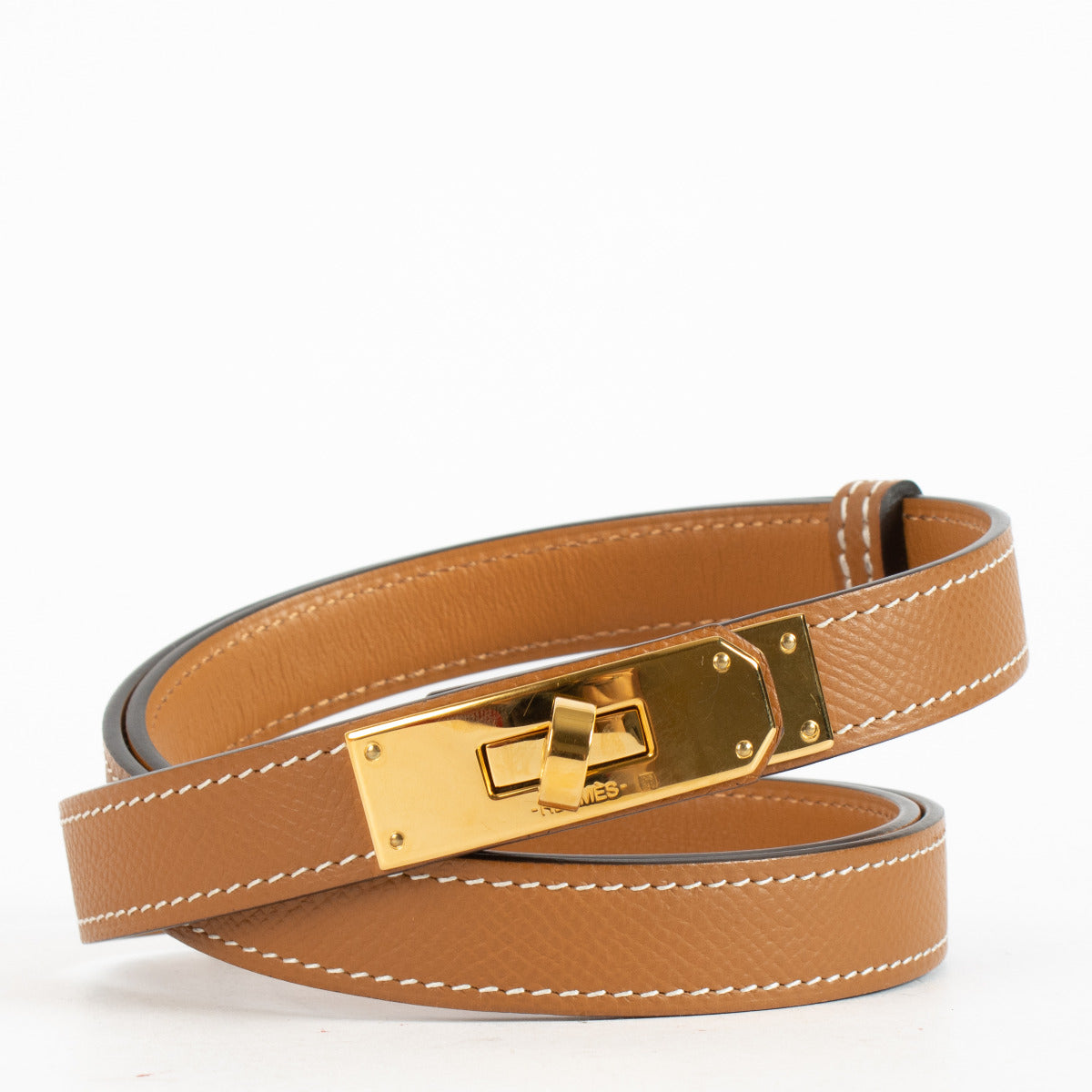 Are you looking for an authentic designer accessory? We buy and sell your preloved and brand new Hermès Kelly 18 Belt Gold Epsom GHW.
