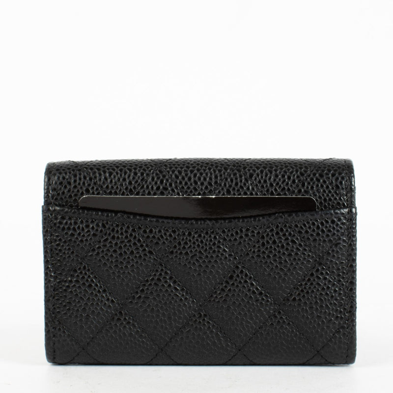 Authentic pre-loved Chanel Black Caviar Quilted Flap Card Holder Wallet on Labellov.com