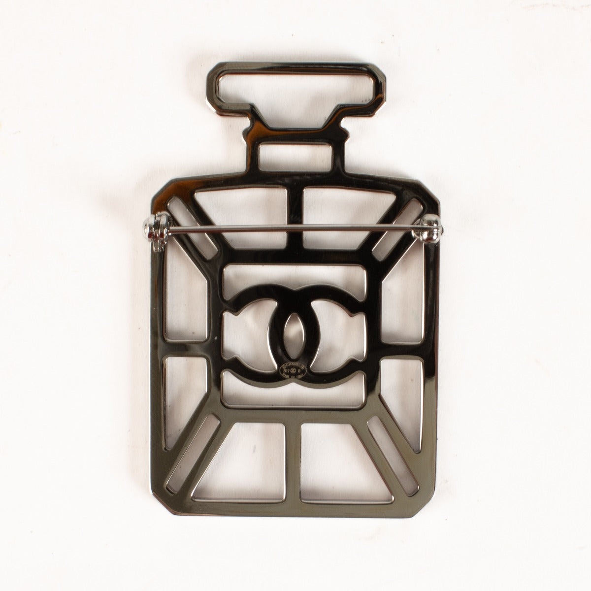 Authentic pre-loved Chanel Crystal Perfume Bottle CC Brooch Ruthenium Iridescent Blue on Labellov.com