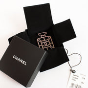 Authentic pre-loved Chanel Crystal Perfume Bottle CC Brooch Ruthenium Iridescent Blue on Labellov.com
