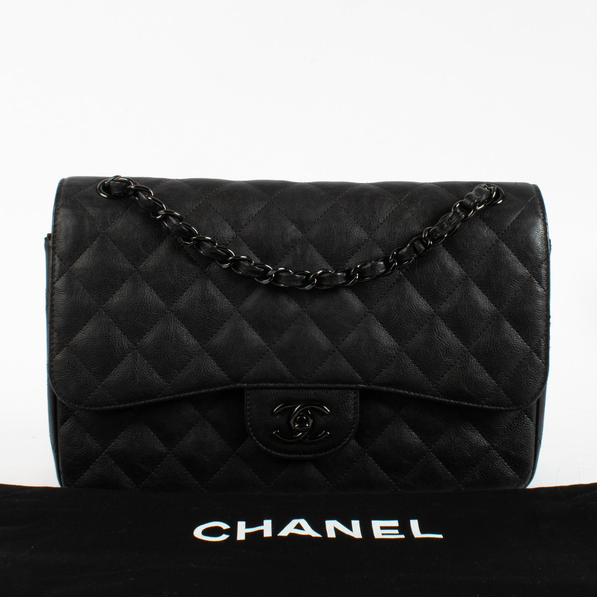 Authentic pre-loved Chanel So Black Aged Cowskin Large / Jumbo Classic Flap Bag on Labellov.com