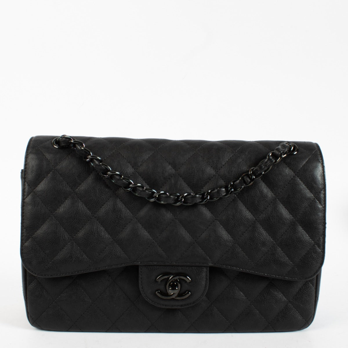 Authentic pre-loved Chanel So Black Aged Cowskin Large / Jumbo Classic Flap Bag on Labellov.com