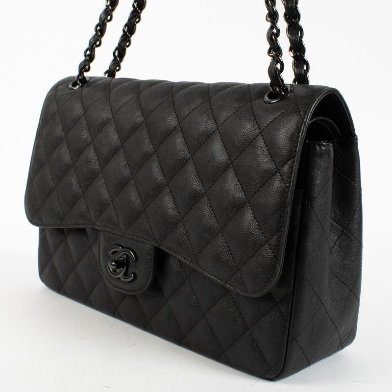Authentic pre-loved Chanel So Black Aged Cowskin Large / Jumbo Classic Flap Bag on Labellov.com