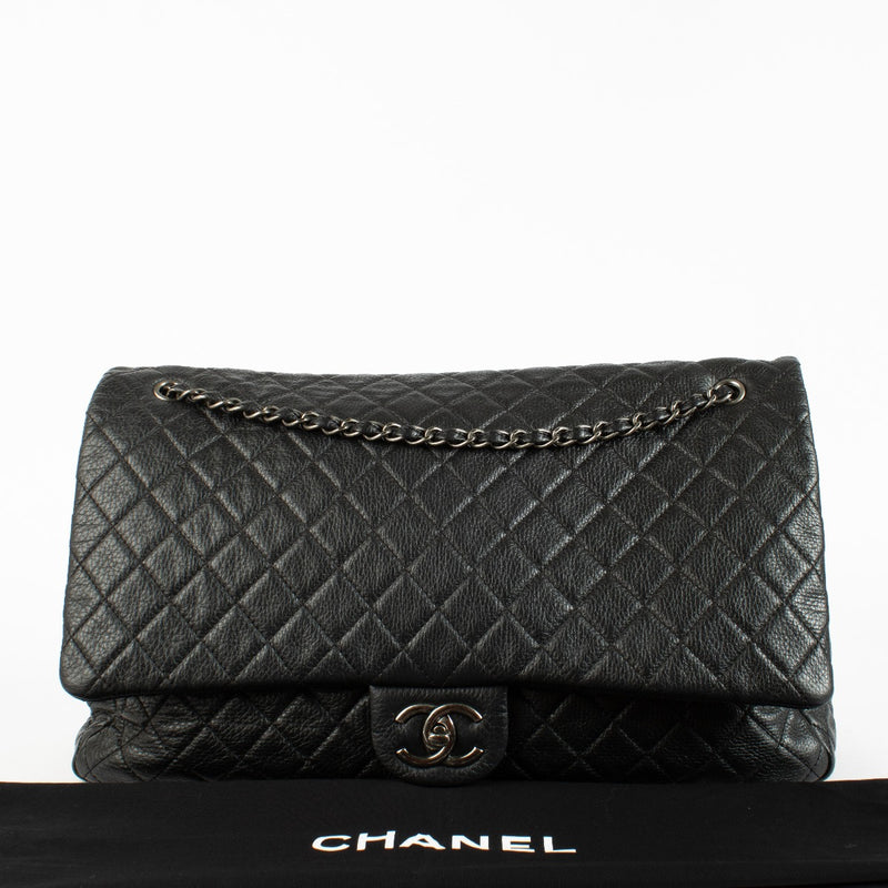 Authentic pre-loved Chanel Black Cowskin XXL Airlines Travel Flap Bag on Labellov.com