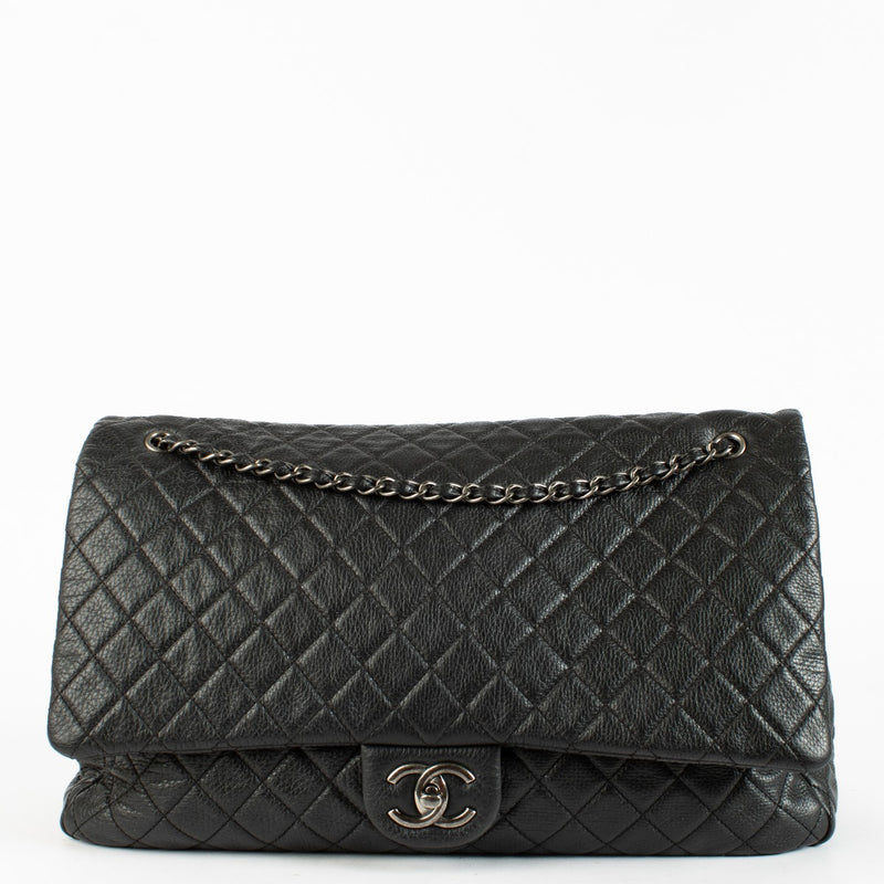 Authentic pre-loved Chanel Black Cowskin XXL Airlines Travel Flap Bag on Labellov.com
