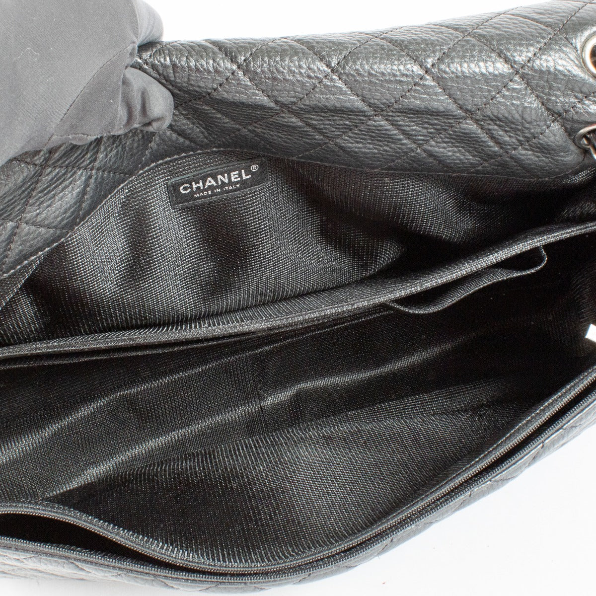 Authentic pre-loved Chanel Black Cowskin XXL Airlines Travel Flap Bag on Labellov.com