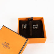 Hermés Noir Mini Pop H Earrings for the best price at Labellov secondhand luxury in Antwerp and Knokke.
