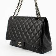 authentic preloved Chanel Maxi Classic Flap Black Caviar SHW on Labellov.com