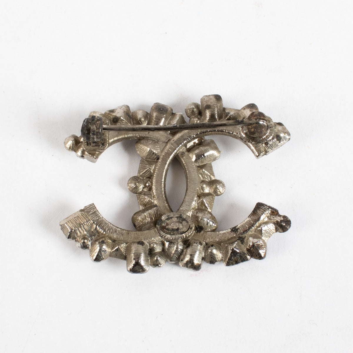 authentic preloved Chanel 16K Silver CC Brooch on Labellov.com