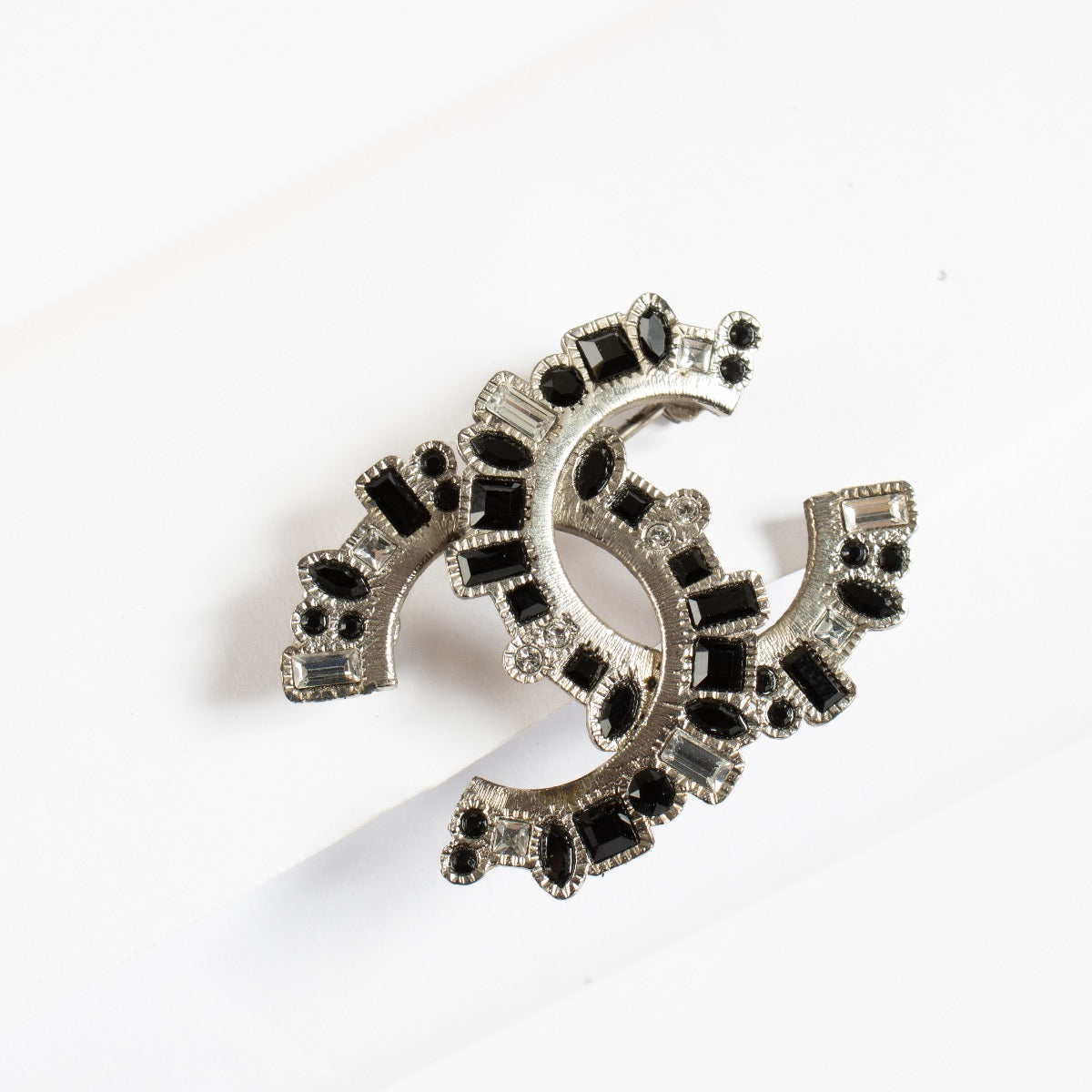 authentic preloved Chanel 16K Silver CC Brooch on Labellov.com