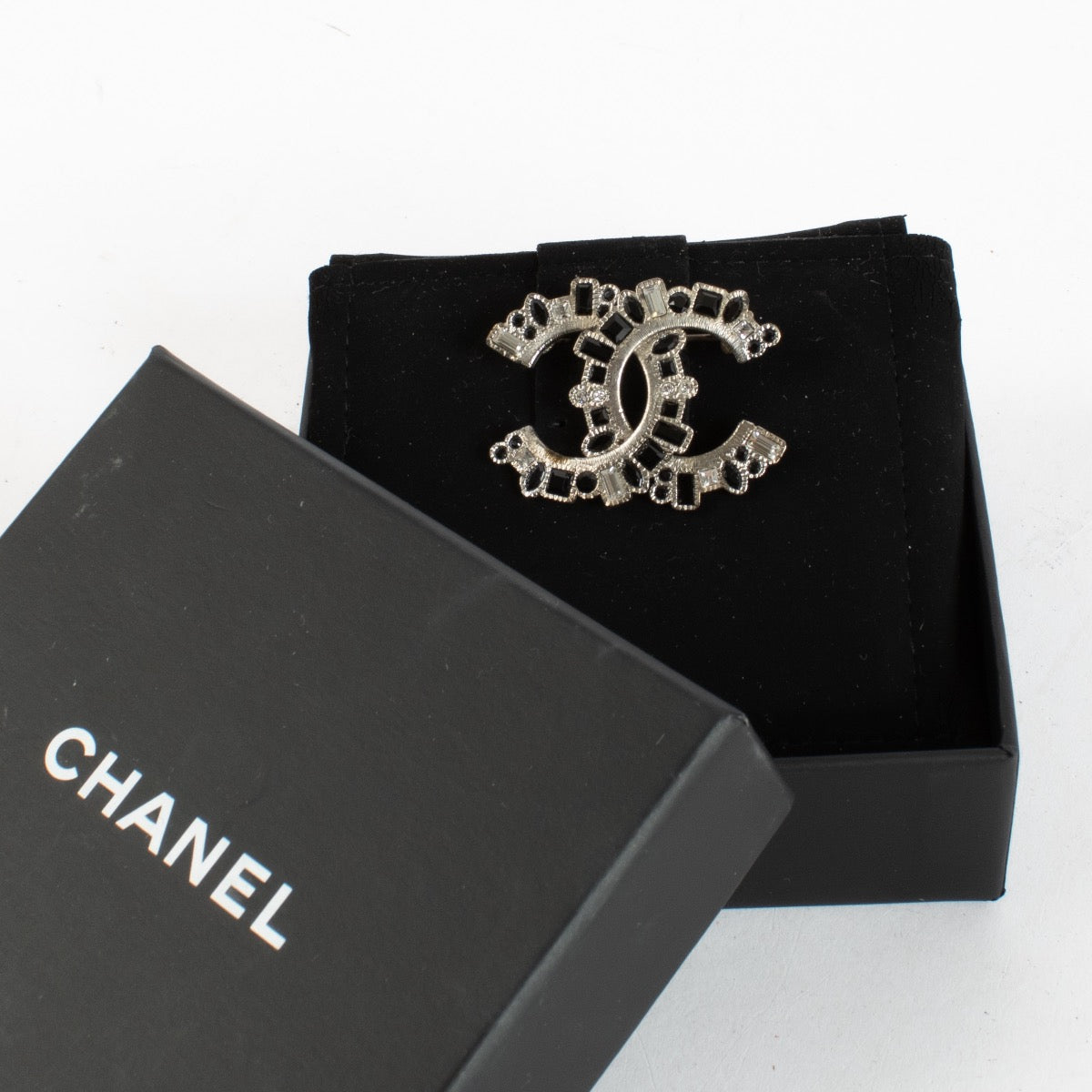 authentic preloved Chanel 16K Silver CC Brooch on Labellov.com