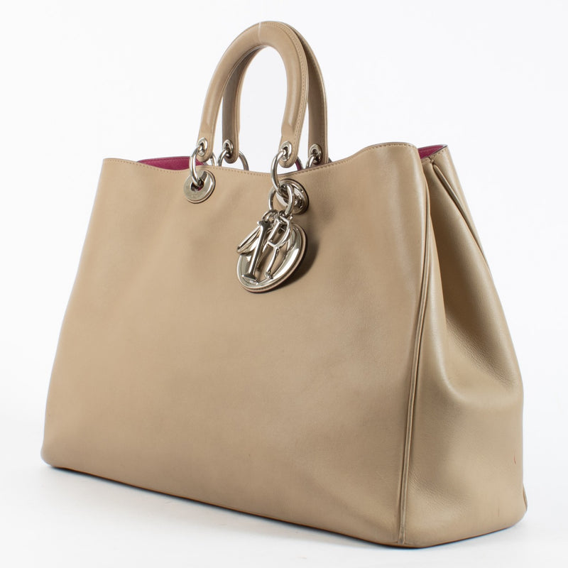 Dior Diorissimo Large beige calfskin top handle bag with silver-tone hardware, removable pouch and shoulder strap at Labellov.com