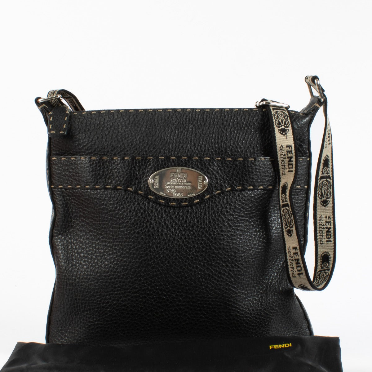 Fendi Black Selleria crossbody bag in grained leather with stitched details and fabric strap at Labellov.com