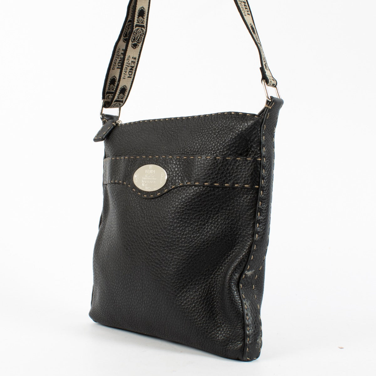 Fendi Black Selleria crossbody bag in grained leather with stitched details and fabric strap at Labellov.com