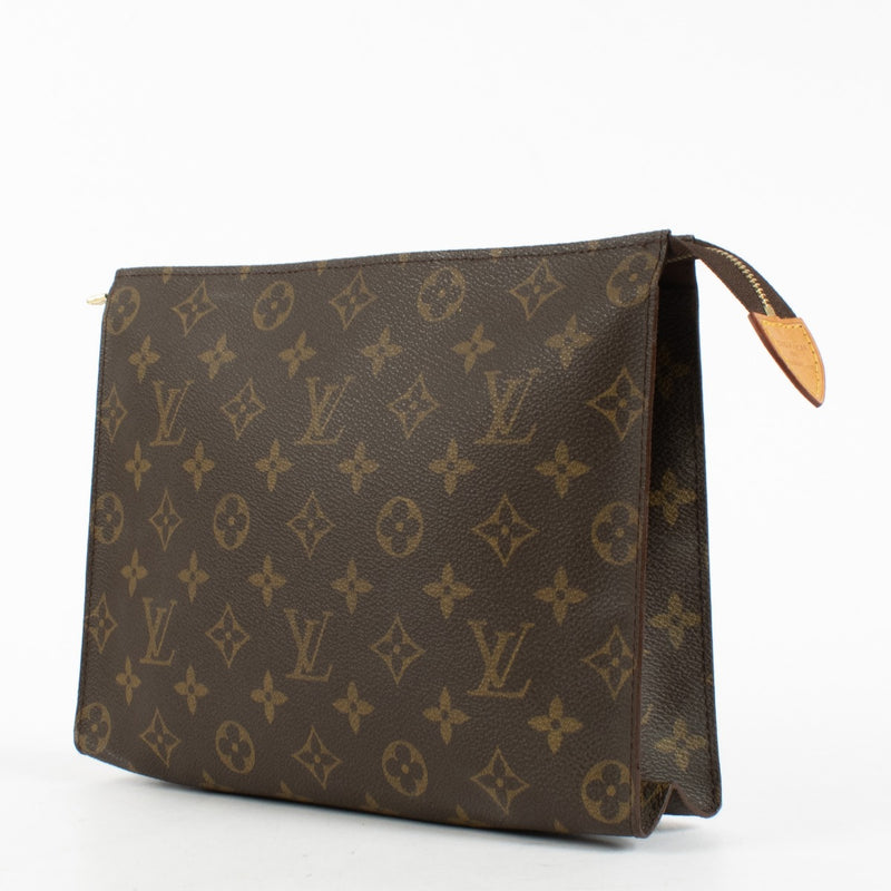 Louis Vuitton Monogram Toiletry Pouch in brown coated canvas with leather trim at Labellov.com