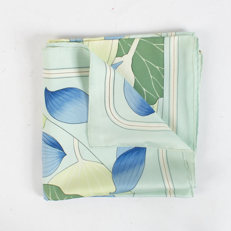 Are you looking for an authentic designer accessory? We buy and sell your preloved and brand new Hermès Blue Fleurs De Lotus 90 Scarf.