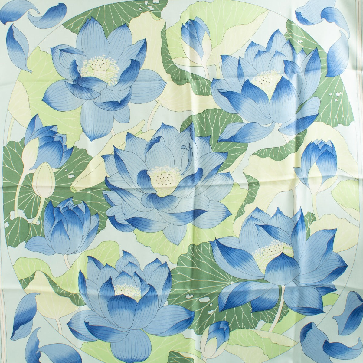 Are you looking for an authentic designer accessory? We buy and sell your preloved and brand new Hermès Blue Fleurs De Lotus 90 Scarf.