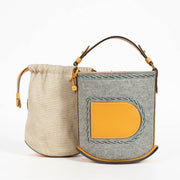 Authentic pre-loved Delvaux Multicolor Felt Le Pin Mini Bucket Bag on Labellov.com
