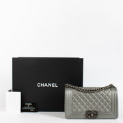 Chanel Silver Medium Boy Bag with quilted leather and aged hardware at Labellov.com