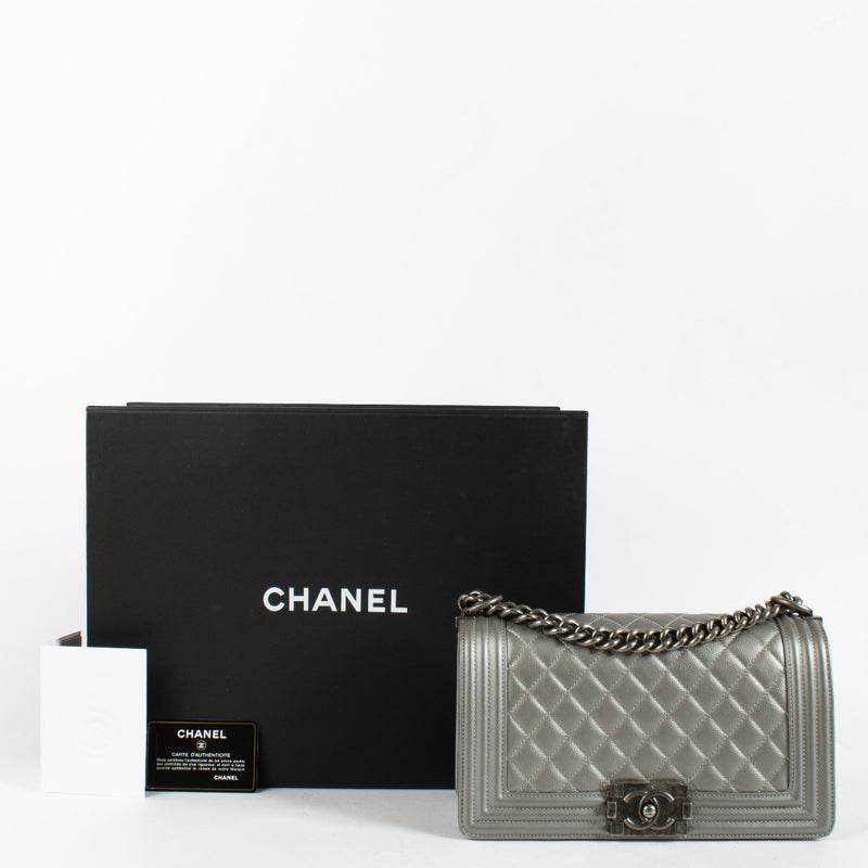 Chanel Silver Medium Boy Bag with quilted leather and aged hardware at Labellov.com