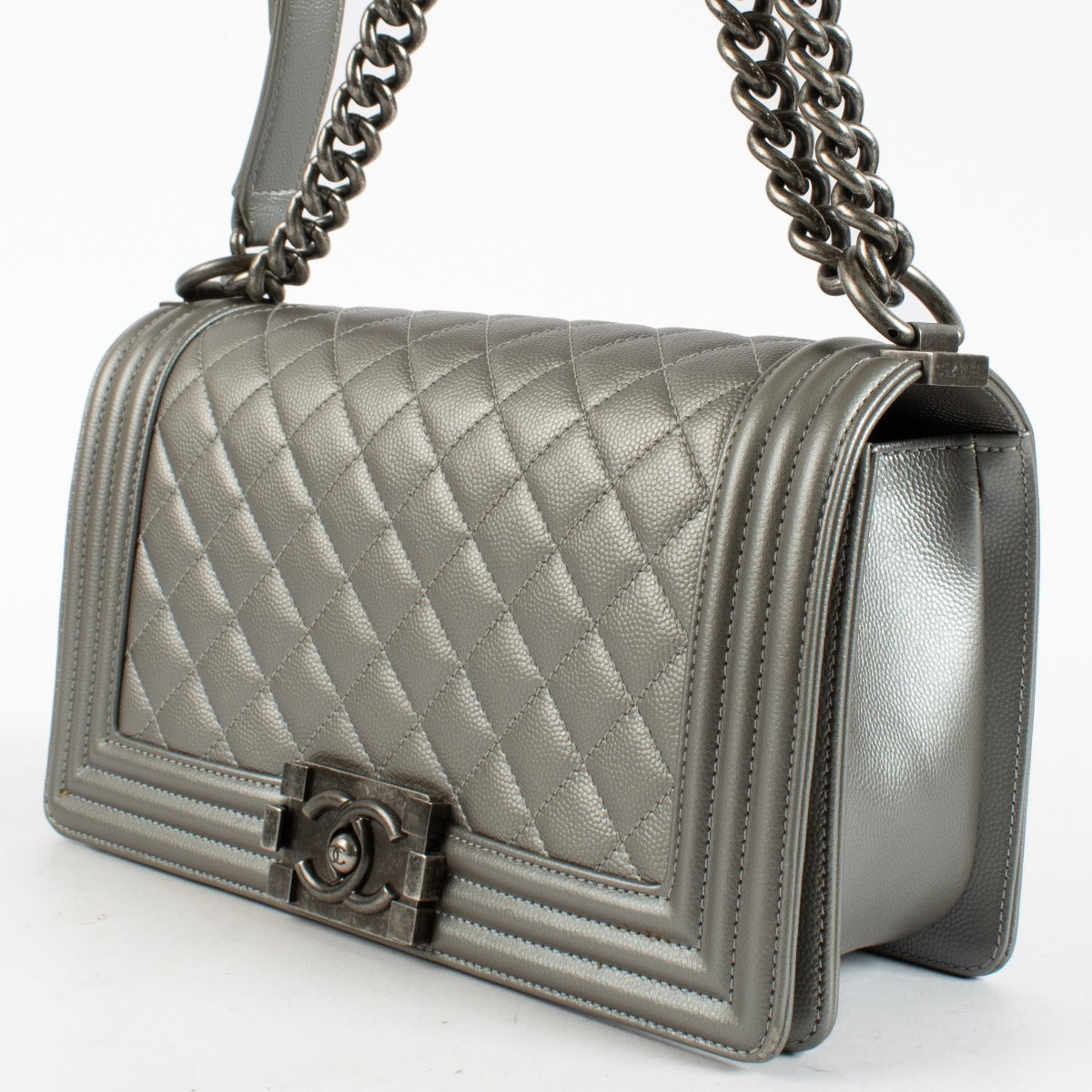 Chanel Silver Medium Boy Bag with quilted leather and aged hardware at Labellov.com