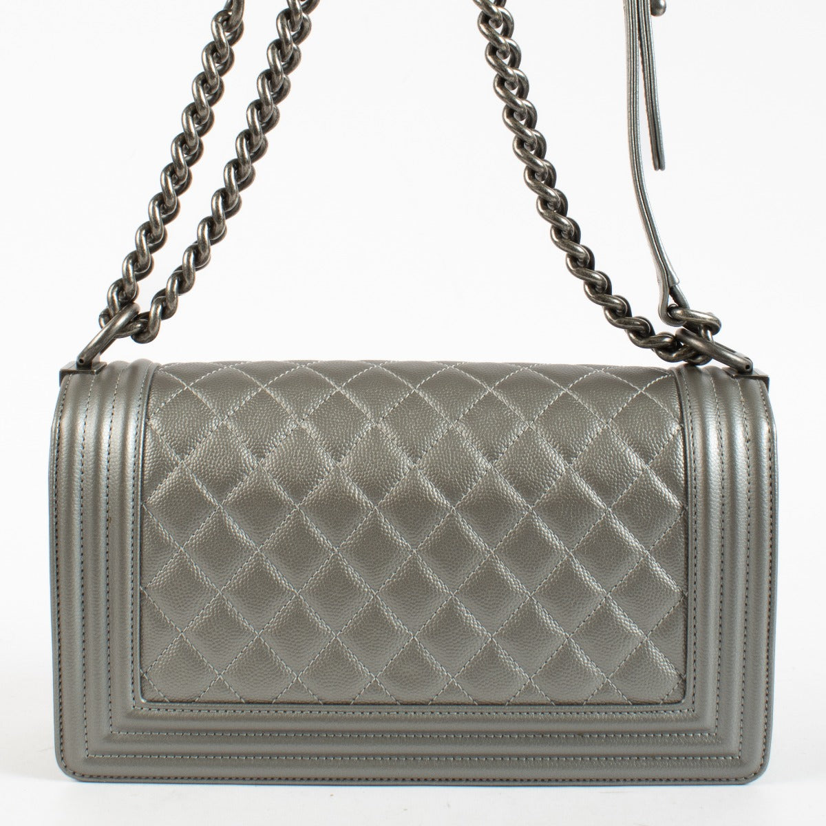 Chanel Silver Medium Boy Bag with quilted leather and aged hardware at Labellov.com