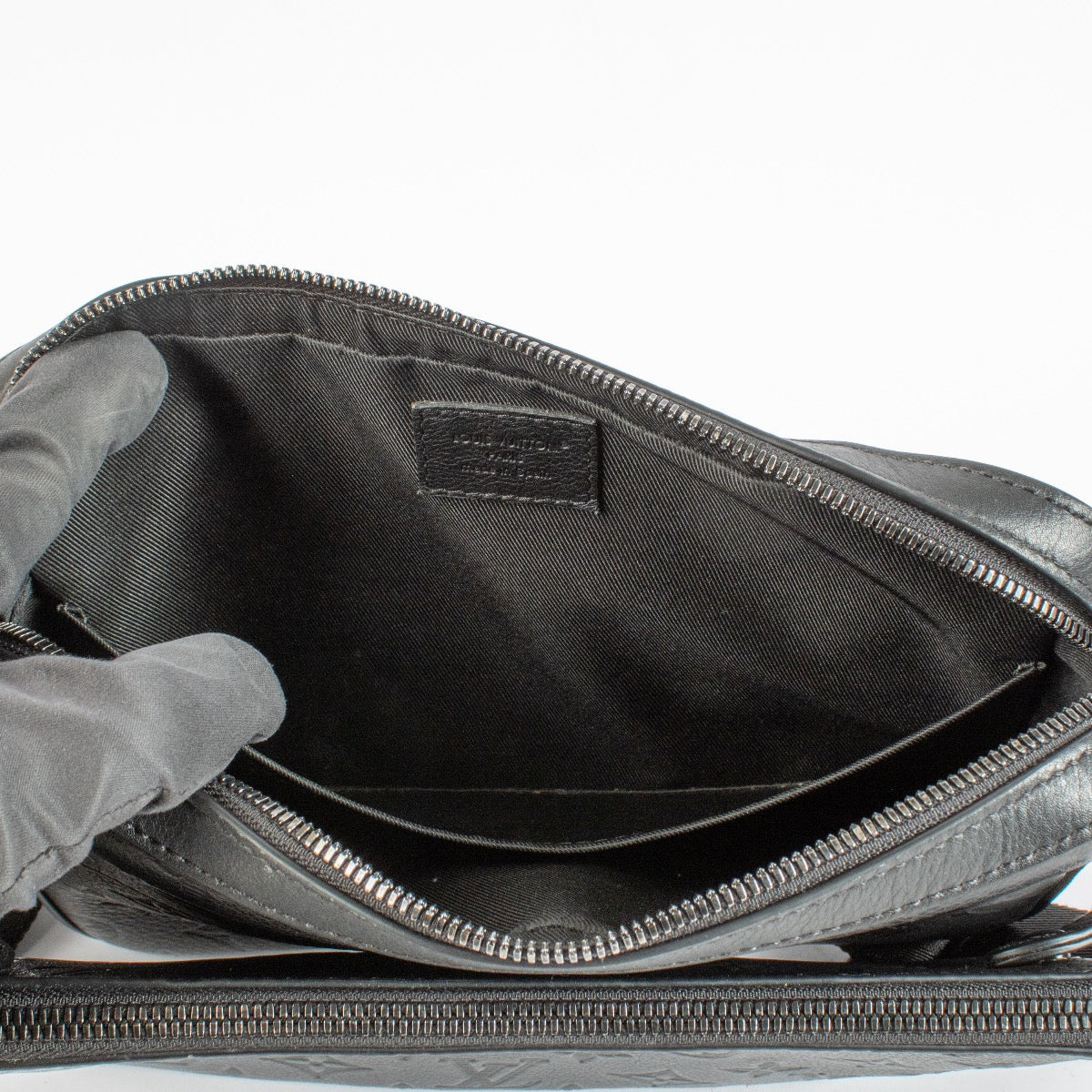 Authentic pre-loved Louis Vuitton Black Monogram Shadow Trio Messenger Bag on Labellov.com