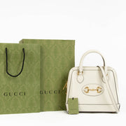 Shop this authentic Gucci White 1955 Top Handle Bag pre-loved on Labellov.com