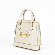 Shop this authentic Gucci White 1955 Top Handle Bag pre-loved on Labellov.com