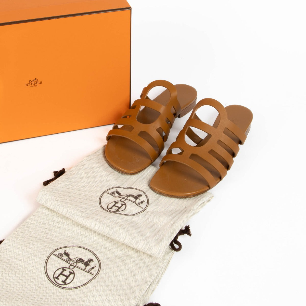 Shop this authentic Hermès Brown Camelia Sandals pre-loved on Labellov.com