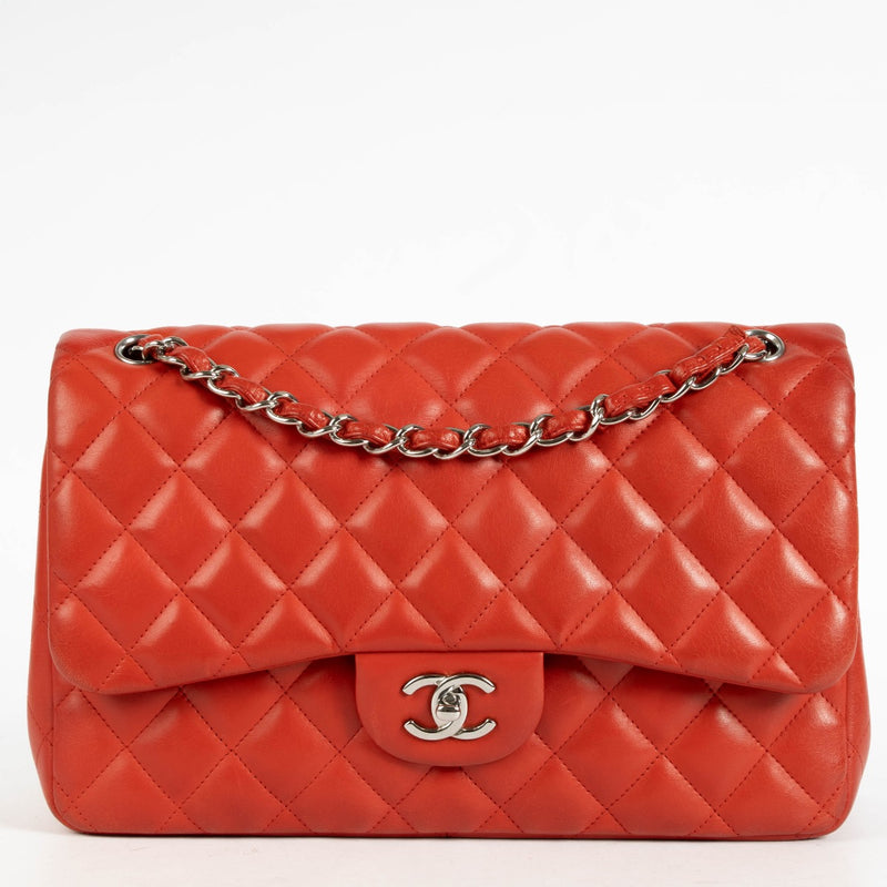 Shop the authentic Chanel Red Lambskin Large / Jumbo Classic Flap Bag second hand on Labellov.com.