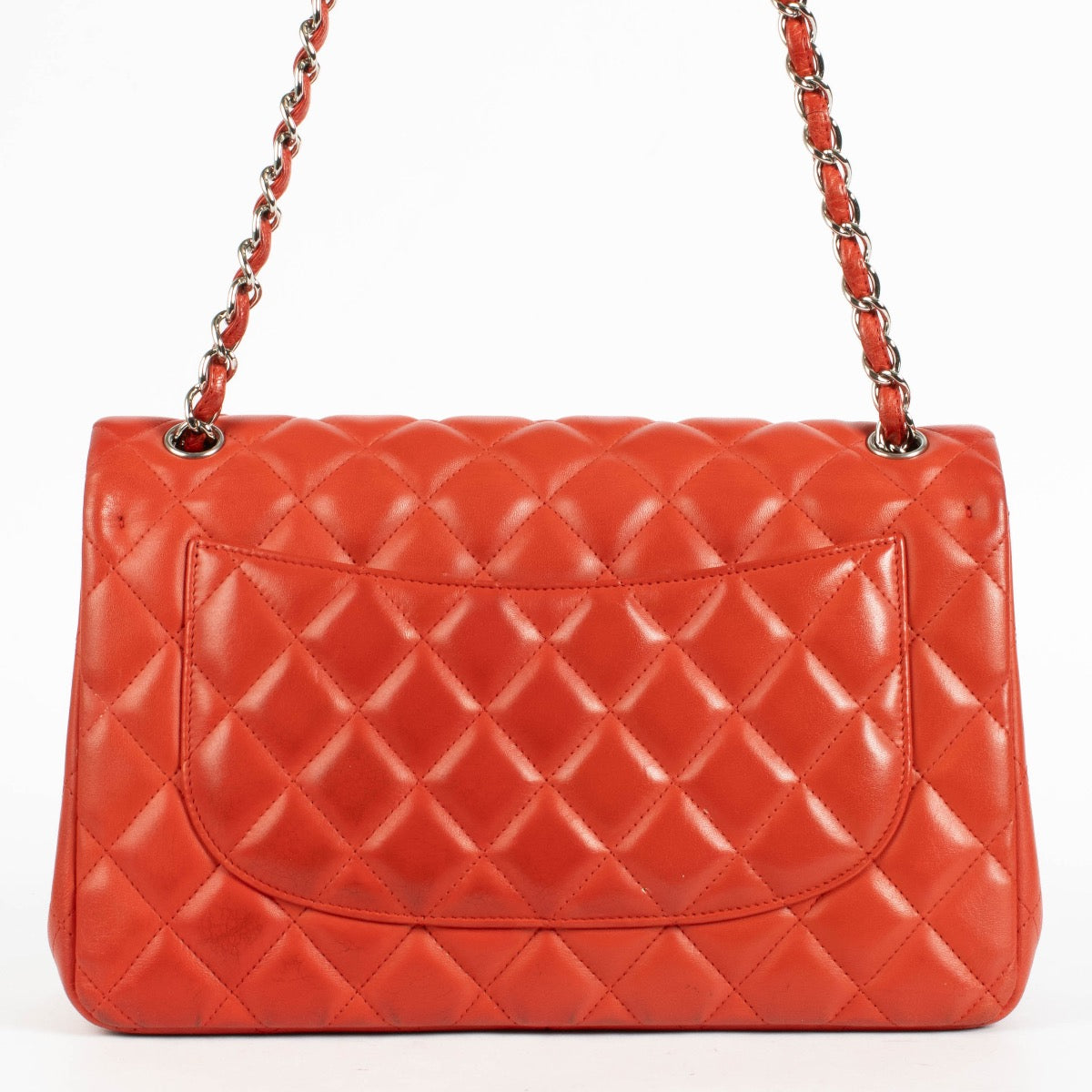 Shop the authentic Chanel Red Lambskin Large / Jumbo Classic Flap Bag second hand on Labellov.com.