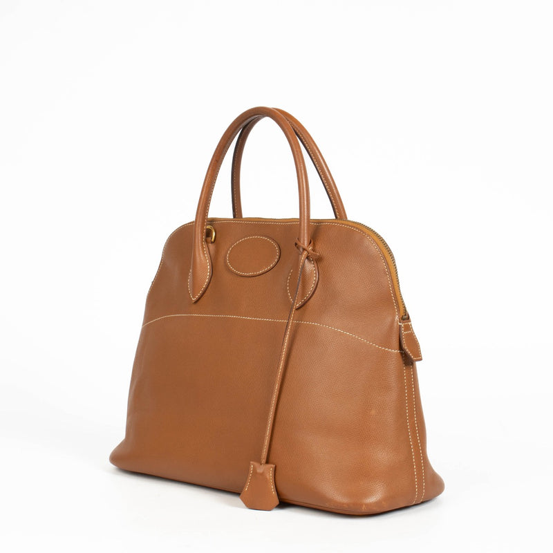 Shop the authentic pre-loved Hermès Bolide 35 Gold Courchevel GHW on Labellov.com