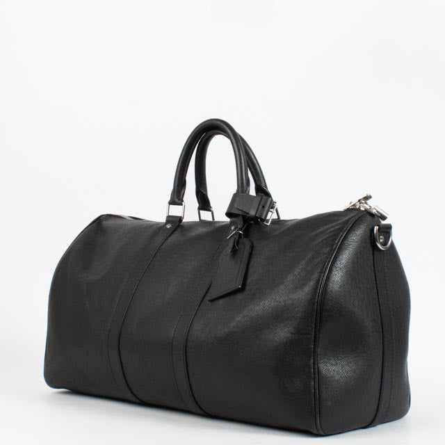Shop the authentic Louis Vuitton Black Taiga Leather Keepall Bandoulière 50 second hand on Labellov.com