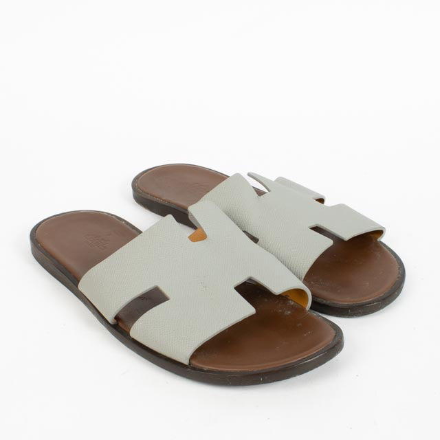 Shop the authentic Hermès Grey Izmir Sandals Size 44 second hand on Labellov.com.